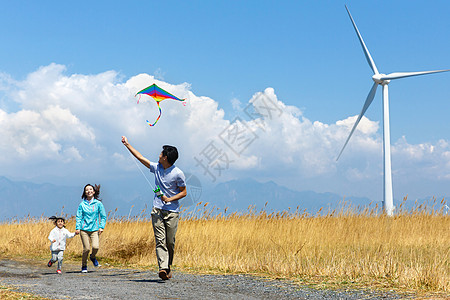 麦田风景快乐家庭在户外郊游背景