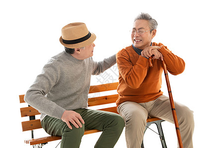 两位老朋友坐在长椅上聊天图片
