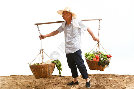 毛巾拍摄农民挑着蔬菜背景