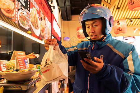 外卖员在餐厅取餐图片