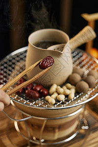 炭火围炉烤茶烤坚果红枣图片