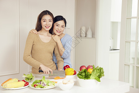 母女温馨母女居家厨房烹饪形象背景