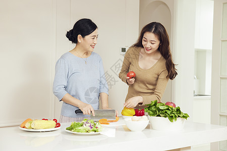 关爱女性母女家庭厨房备菜互动背景