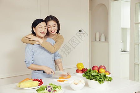 母女做饭母女居家厨房烹饪背景