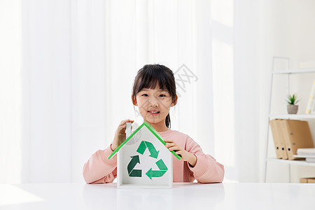 倡导绿色节能小女孩倡导绿色低碳环保背景