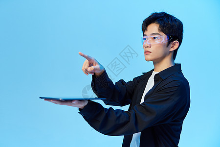 虚拟科技科技男青年触碰虚拟屏幕手势背景