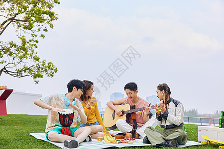 吉他插画青年人户外野餐弹琴唱歌背景