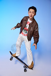 炫酷的滑板动作潮流滑板青年男性背景
