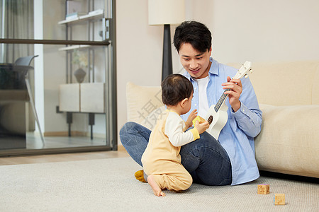 儿童互动父亲居家陪伴孩子玩耍弹琴背景
