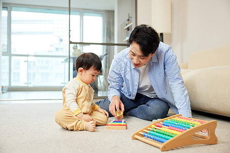 玩具单亲爸爸在家陪伴孩子玩耍背景