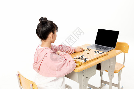 人机互动小女孩和电脑人机挑战围棋背景