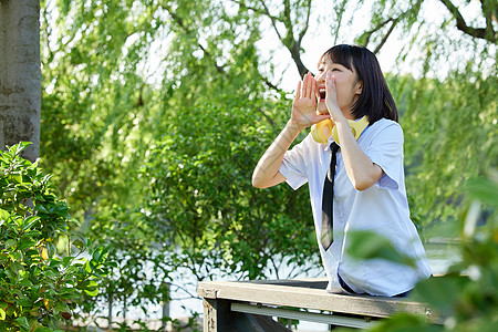 卡通少女可爱女学生呐喊背景