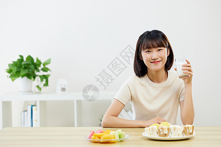 牛奶美女女性居家健康饮食背景