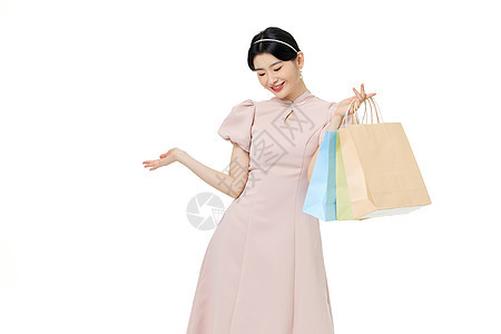新中式女性手拿购物袋图片