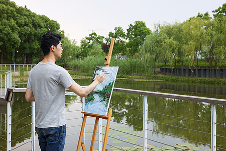 荷花油画户外画画写生的男性背景