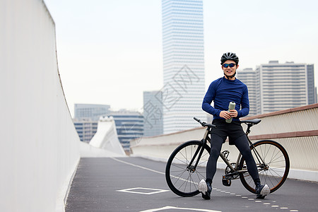单车都市运动骑行青年形象背景