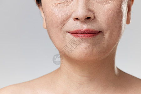 美容面部护理中年女性皮肤特写背景
