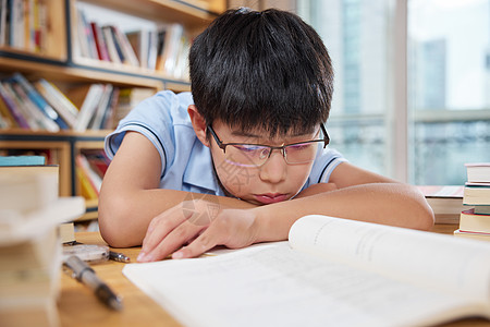 睡着学习压力大疲惫的学生背景