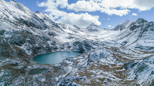 航拍川西雪山背景图片