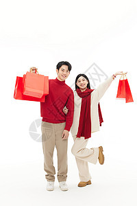 欢乐情侣高举新年礼盒背景图片