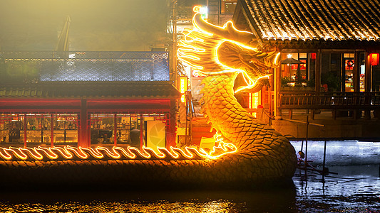 龙年新年元旦春节龙船夜景图片