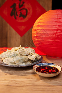 中式福字背景下的一碗水饺图片