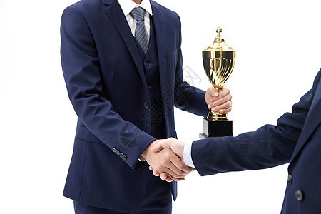 商务人士握手领奖图片