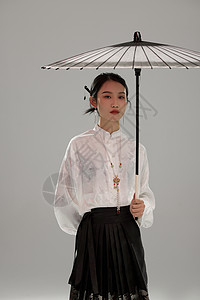 中国伞撑着伞的国风美女形象背景