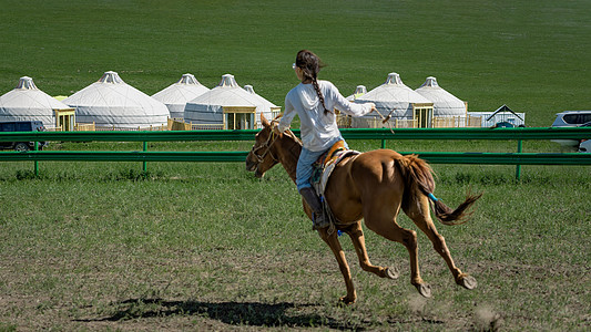 骑马奔腾内蒙古那达慕蒙古族骑手背景