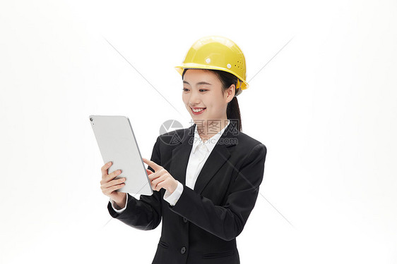 专业女工程师手里拿着平板微笑指挥图片