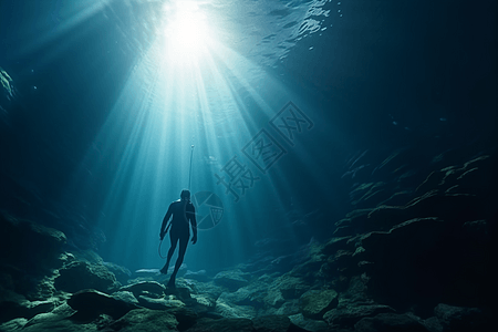 潜水员探索海洋深处图片