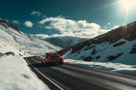 一辆红色跑车在冰雪覆盖的山口中赛车图片