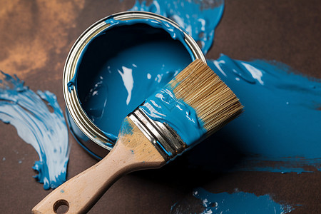 蓝色油漆颜料与板刷背景
