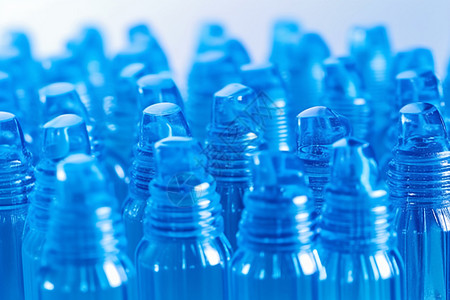 塑料瓶包装展示流水线上的饮料瓶背景