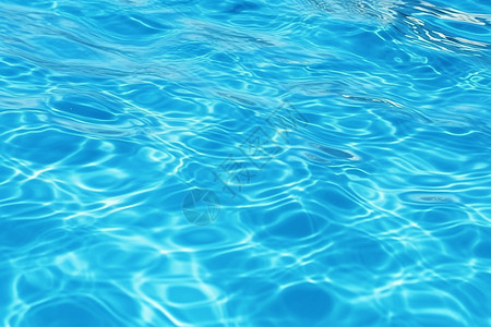 蓝色游泳池的水波纹理图片