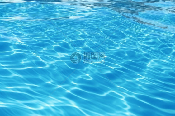 蓝色游泳池的水波图片