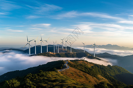 山脉上的风车围绕的云雾风力发电高清图片