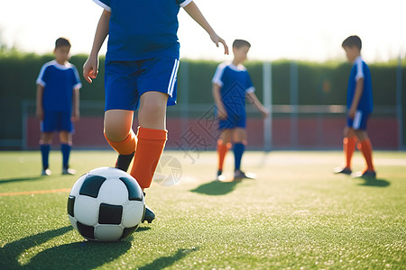儿童运动素材踢足球的儿童球队背景