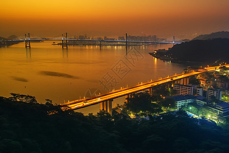 傍晚的交通跨河大桥图片