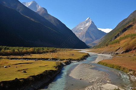 溪流高清素材山脚下的河流和两岸草地背景