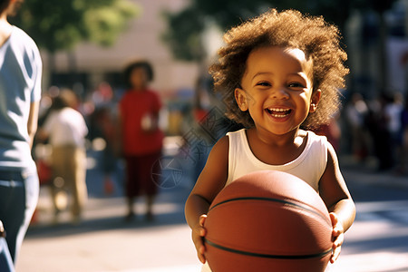 小孩子抱着篮球图片