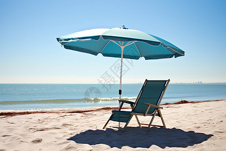 太阳伞笼罩的椅子图片
