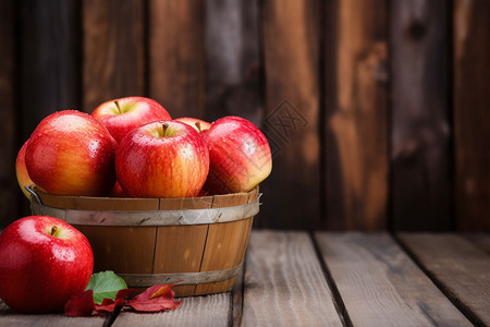 木框中的红苹果背景图片