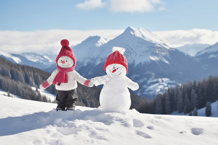 冬季雪山上的小雪人背景图片