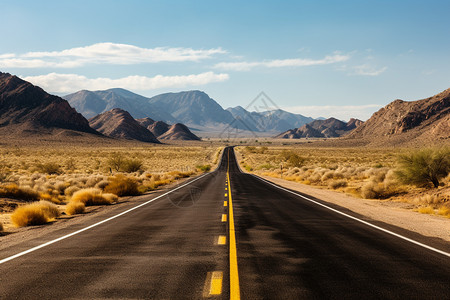 戈壁山脉中的公路背景图片