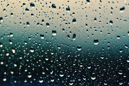 下雨天雨滴滑落玻璃图片