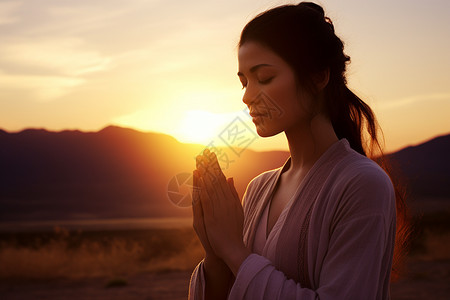 虔诚祈祷的外国女子背景图片