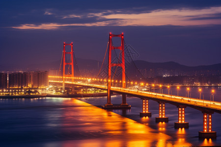 黄昏时灯火通明的城市大桥景观图片