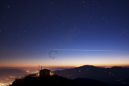 城市流星夜晚天空中的流星景观背景