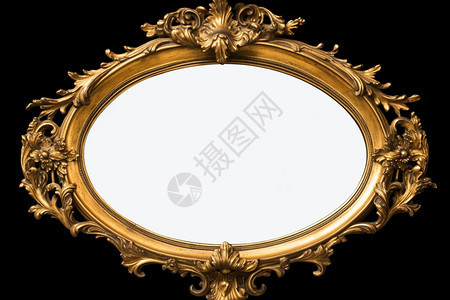 金色边框的镜子在黑色背景上图片